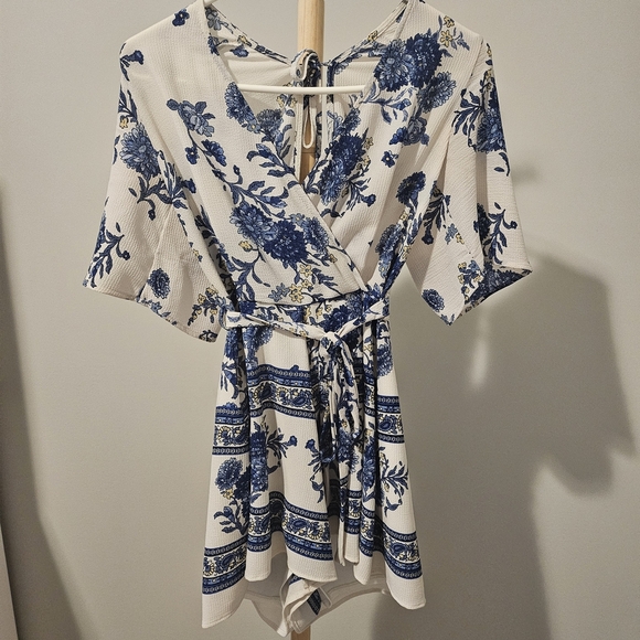 Francesca's Collections Cream Romper with Blue Floral Design - Picture 2 of 4
